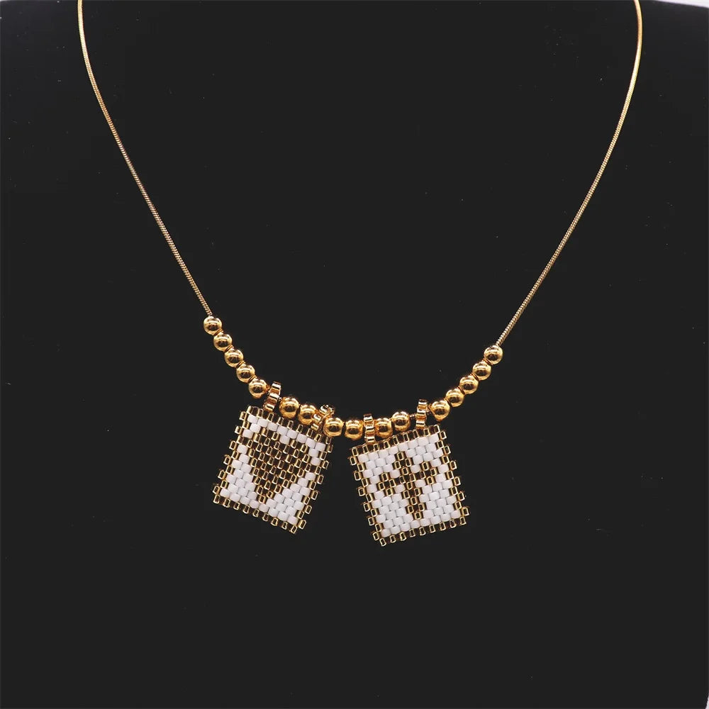 ZHONGVI Miyuki Heart Cross Pendant Necklace | Gold Plated Steel | Worldwide Shipping