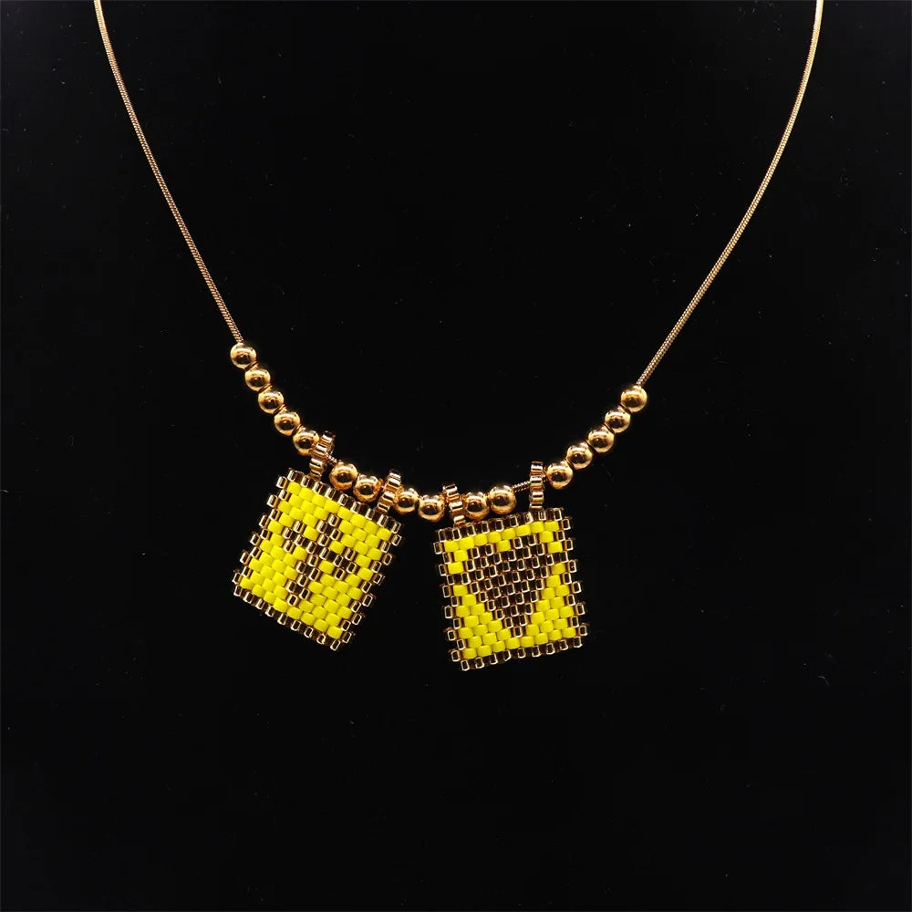 ZHONGVI Miyuki Heart Cross Pendant Necklace | Gold Plated Steel | Worldwide Shipping
