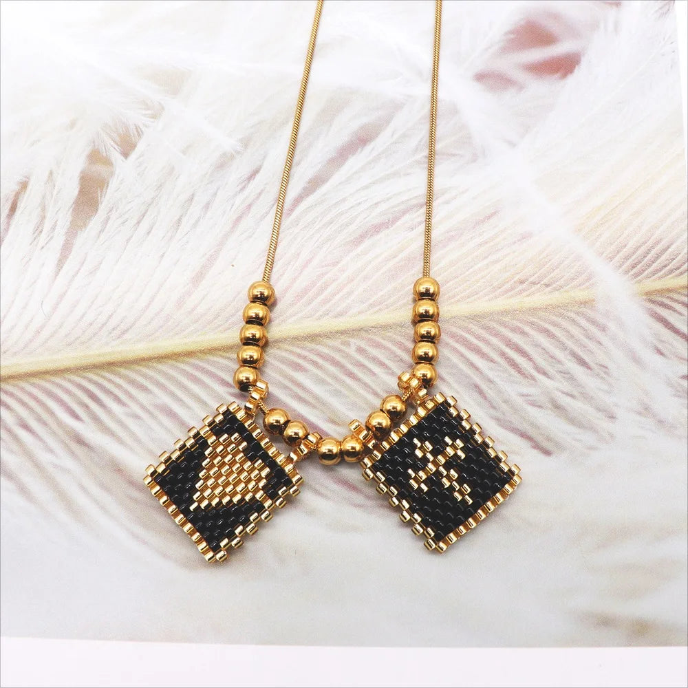 ZHONGVI Miyuki Heart Cross Pendant Necklace | Gold Plated Steel | Worldwide Shipping