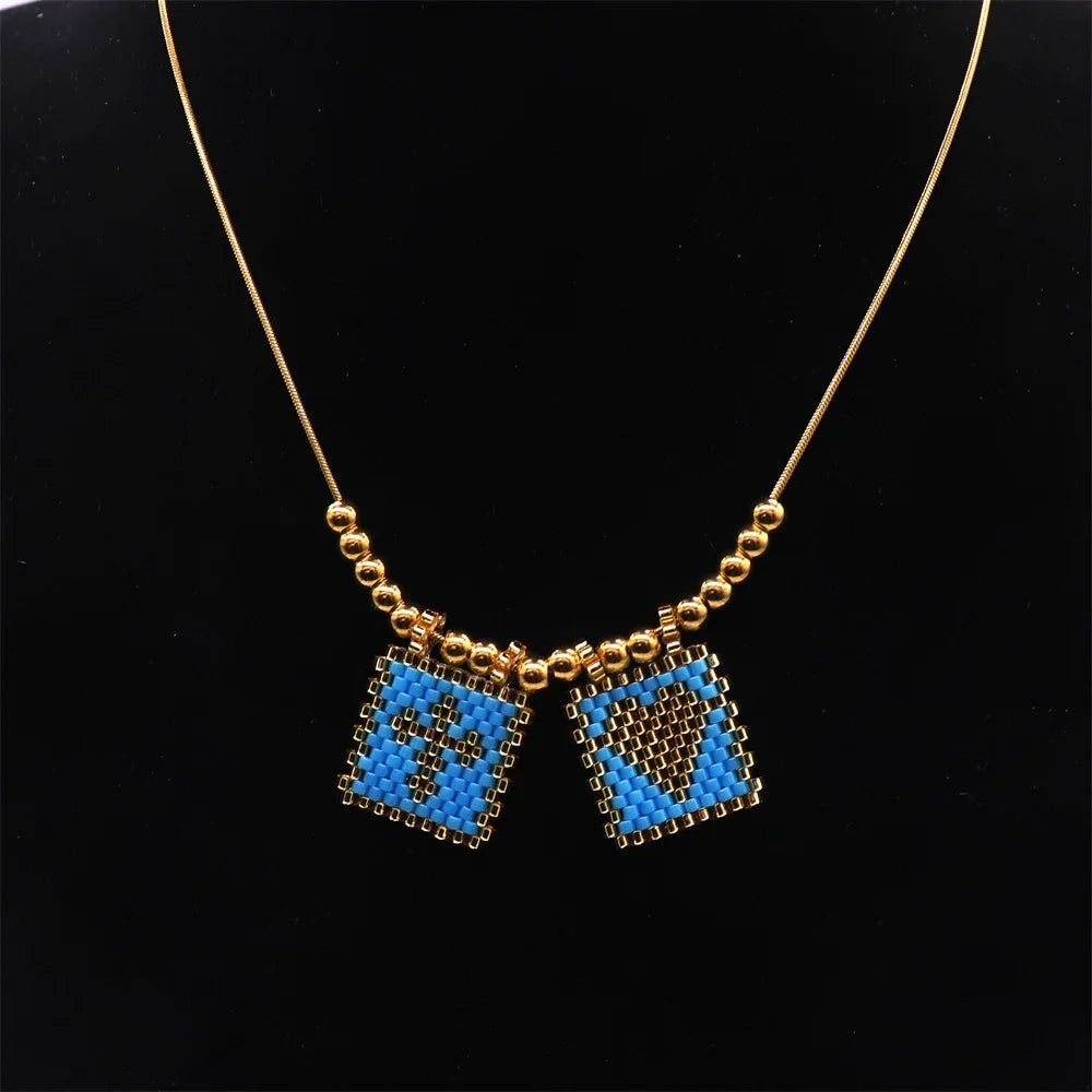 ZHONGVI Miyuki Heart Cross Pendant Necklace | Gold Plated Steel | Worldwide Shipping