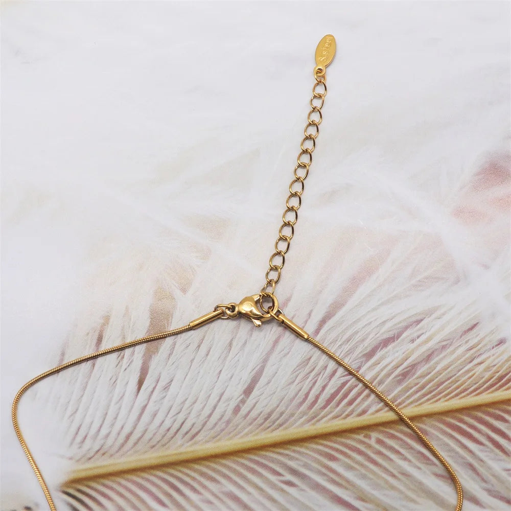 ZHONGVI Miyuki Heart Cross Pendant Necklace | Gold Plated Steel | Worldwide Shipping