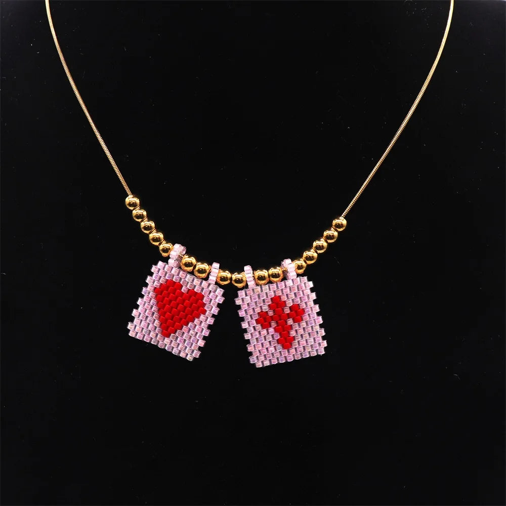 ZHONGVI Miyuki Heart Cross Pendant Necklace | Gold Plated Steel | Worldwide Shipping