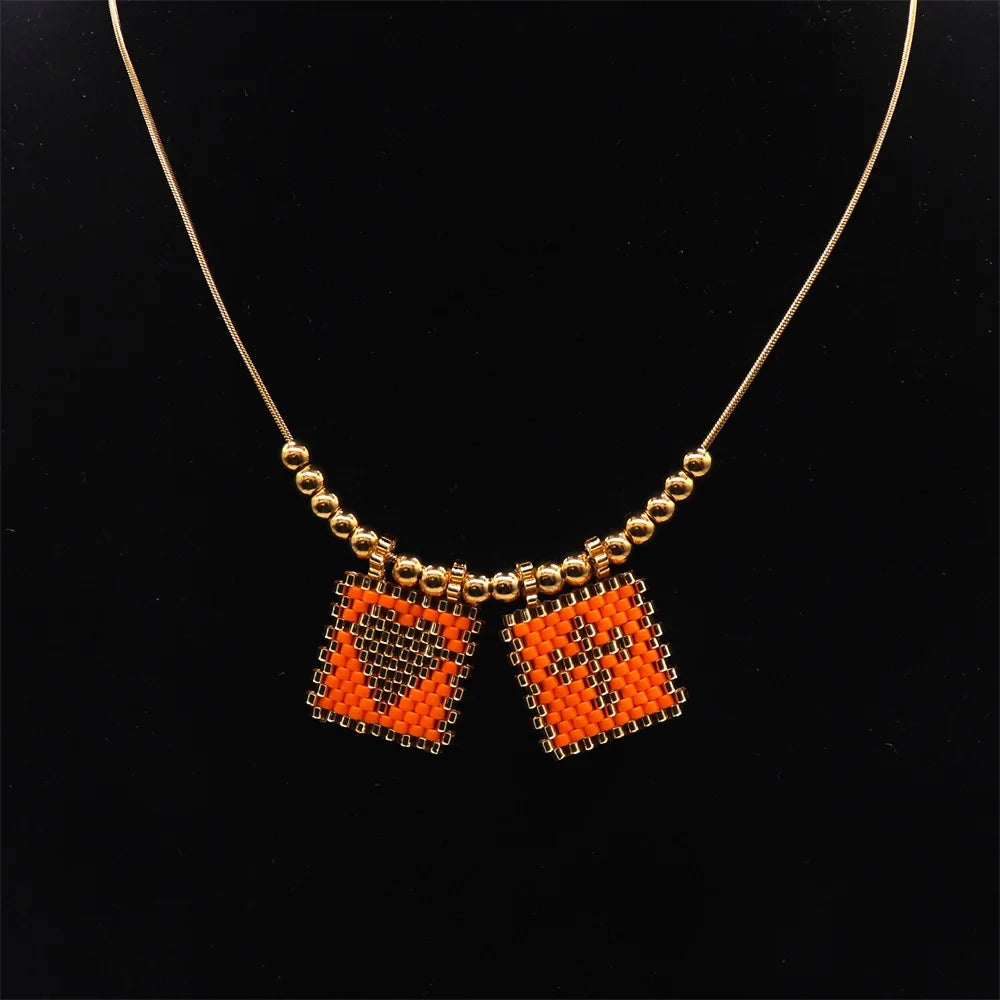 ZHONGVI Miyuki Heart Cross Pendant Necklace | Gold Plated Steel | Worldwide Shipping