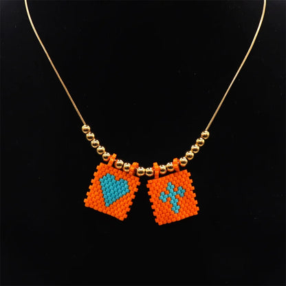 ZHONGVI Miyuki Heart Cross Pendant Necklace | Gold Plated Steel | Worldwide Shipping