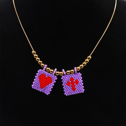 ZHONGVI Miyuki Heart Cross Pendant Necklace | Gold Plated Steel | Worldwide Shipping
