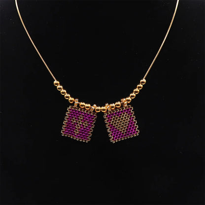 ZHONGVI Miyuki Heart Cross Pendant Necklace | Gold Plated Steel | Worldwide Shipping