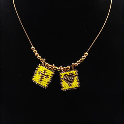 ZHONGVI Miyuki Heart Cross Pendant Necklace | Gold Plated Steel | Worldwide Shipping