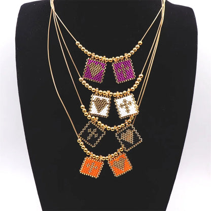 ZHONGVI Miyuki Heart Cross Pendant Necklace | Gold Plated Steel | Worldwide Shipping